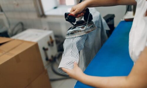 Dry cleaning ironing clothes. Clean cloth chemical process. Laundry industrial dry-cleaning.